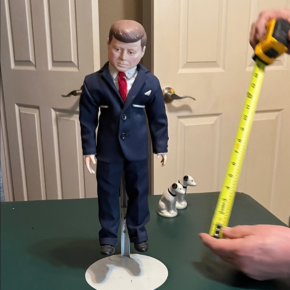 John F. Kennedy ceramic doll on stand